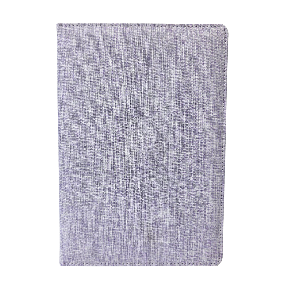 Textured purple fabric journal cover on a white background