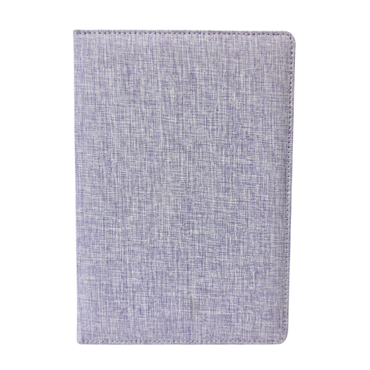 Textured purple fabric journal cover on a white background
