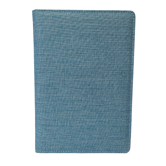 Blue fabric notebook on a white background