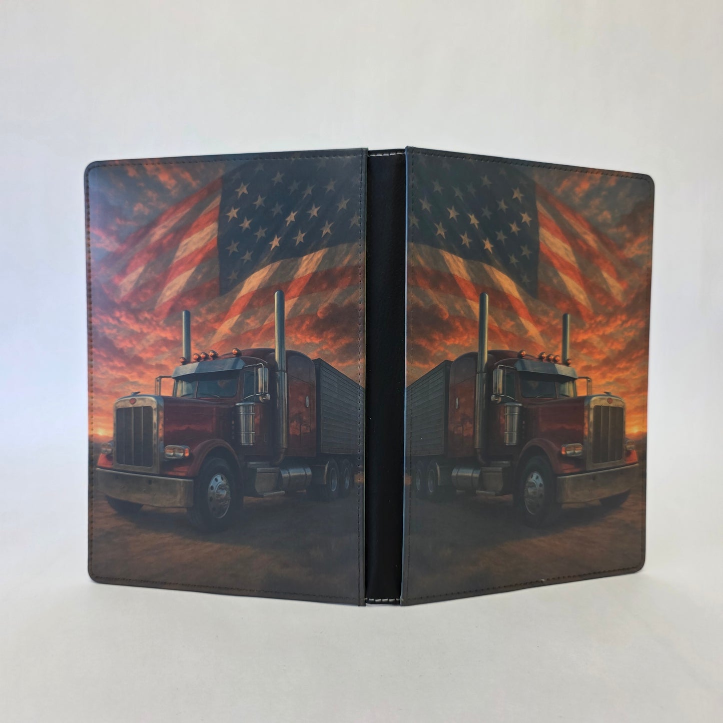 Notebook cover with semi-truck design  American flag and sunset background.