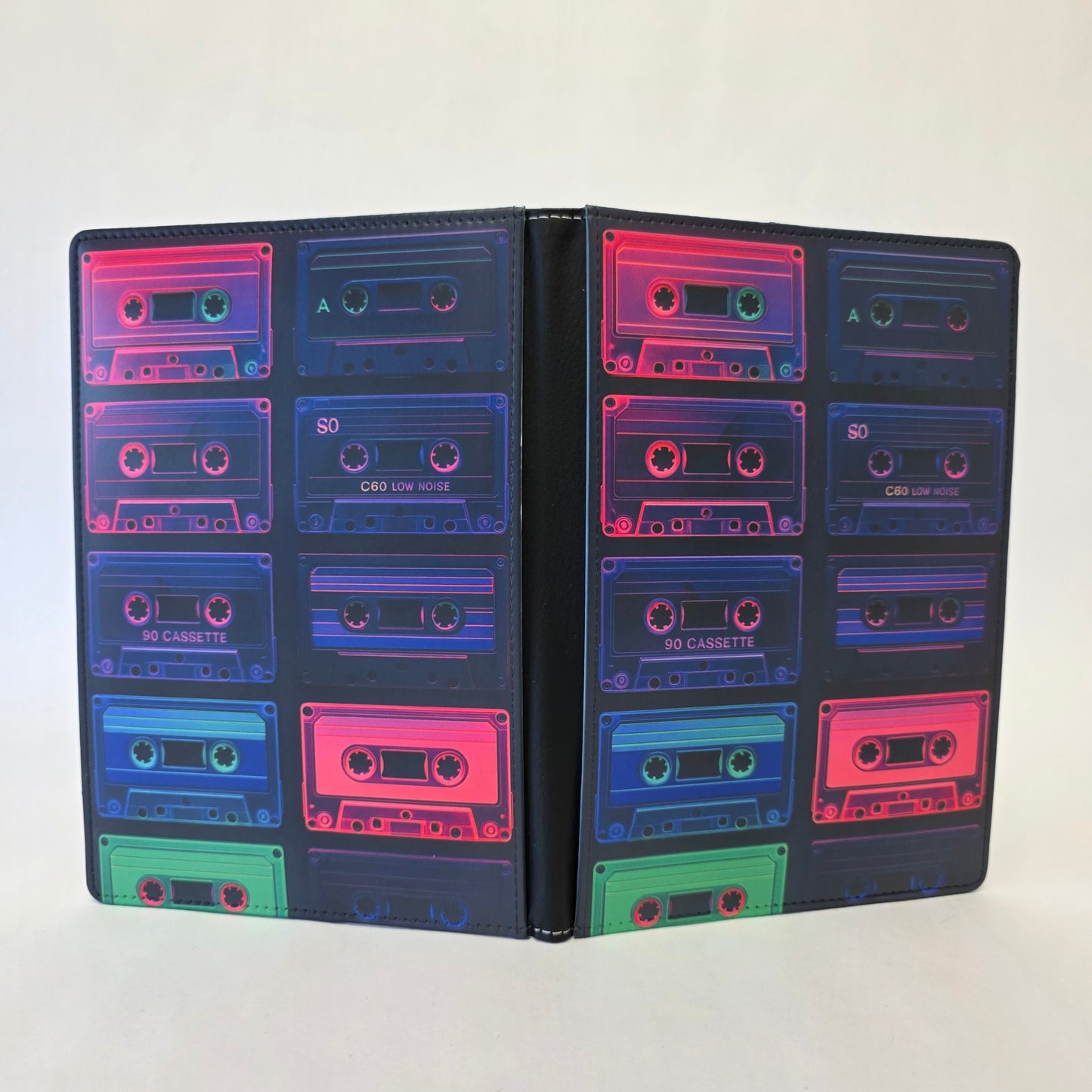 Journal cover with colorful cassette tape design with neon pinks, blues, and greens.
