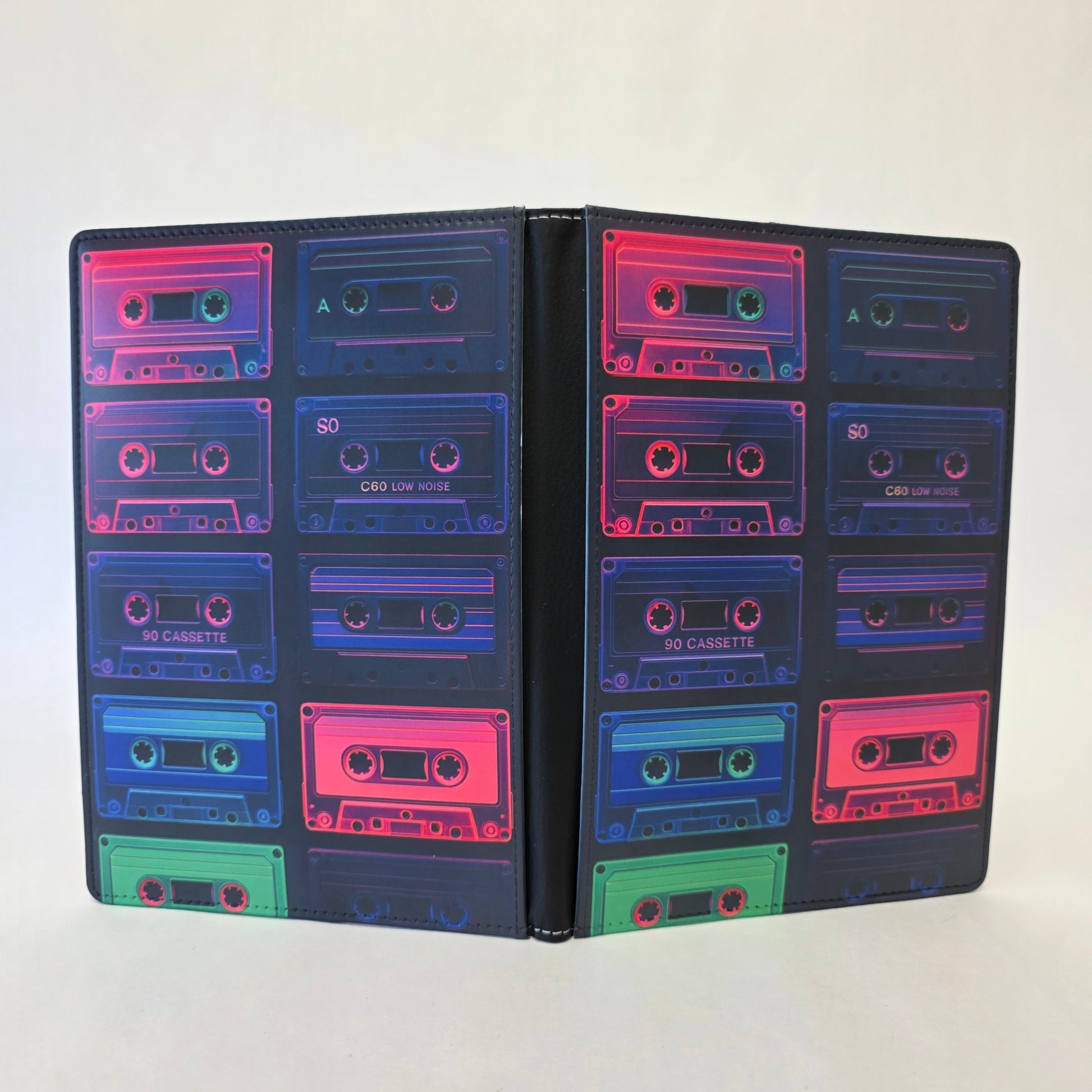Journal cover with colorful cassette tape design with neon pinks, blues, and greens.