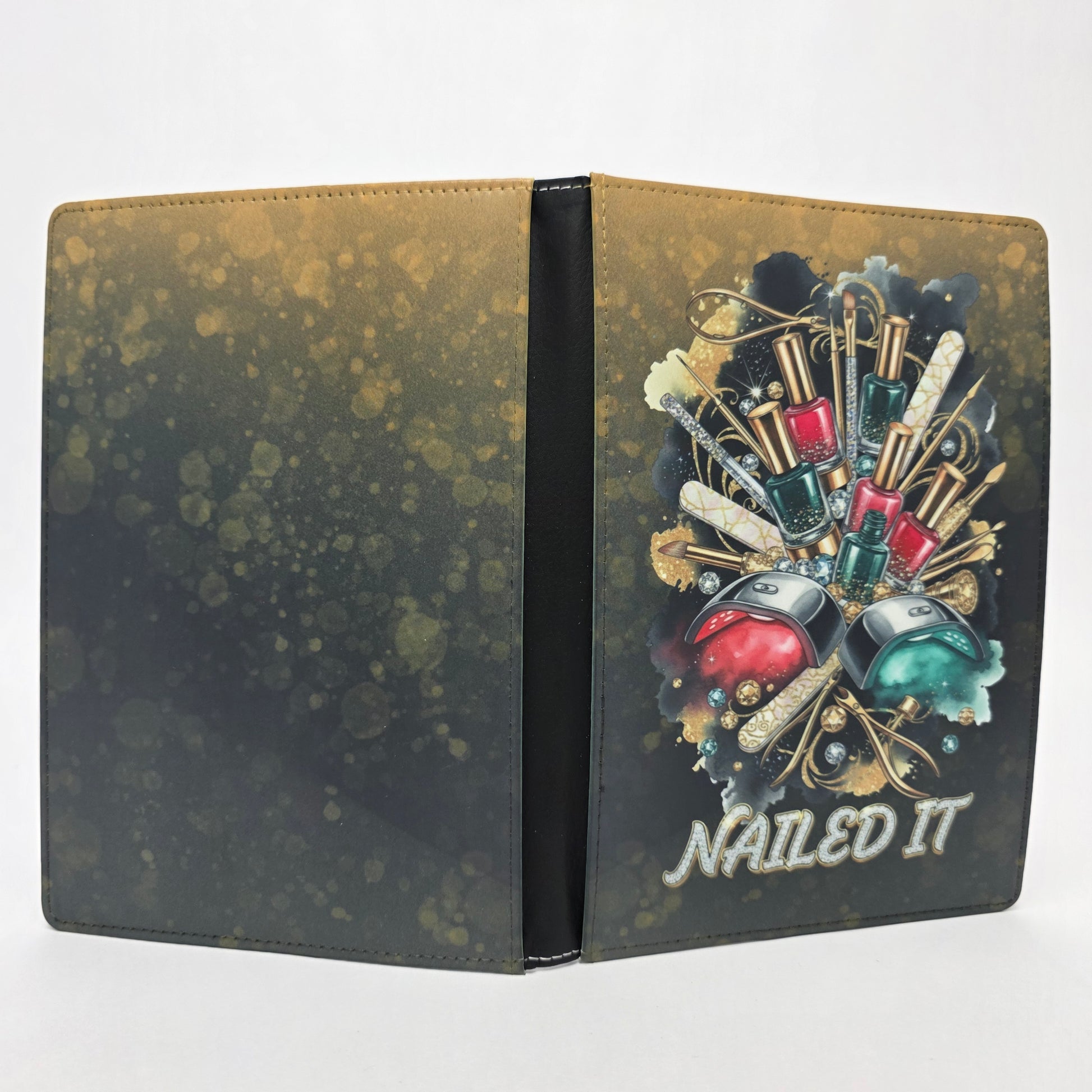Journal cover with nail polish design and 'NAILED IT' text towards on the bottom of the journal. Black and Gold color theme.