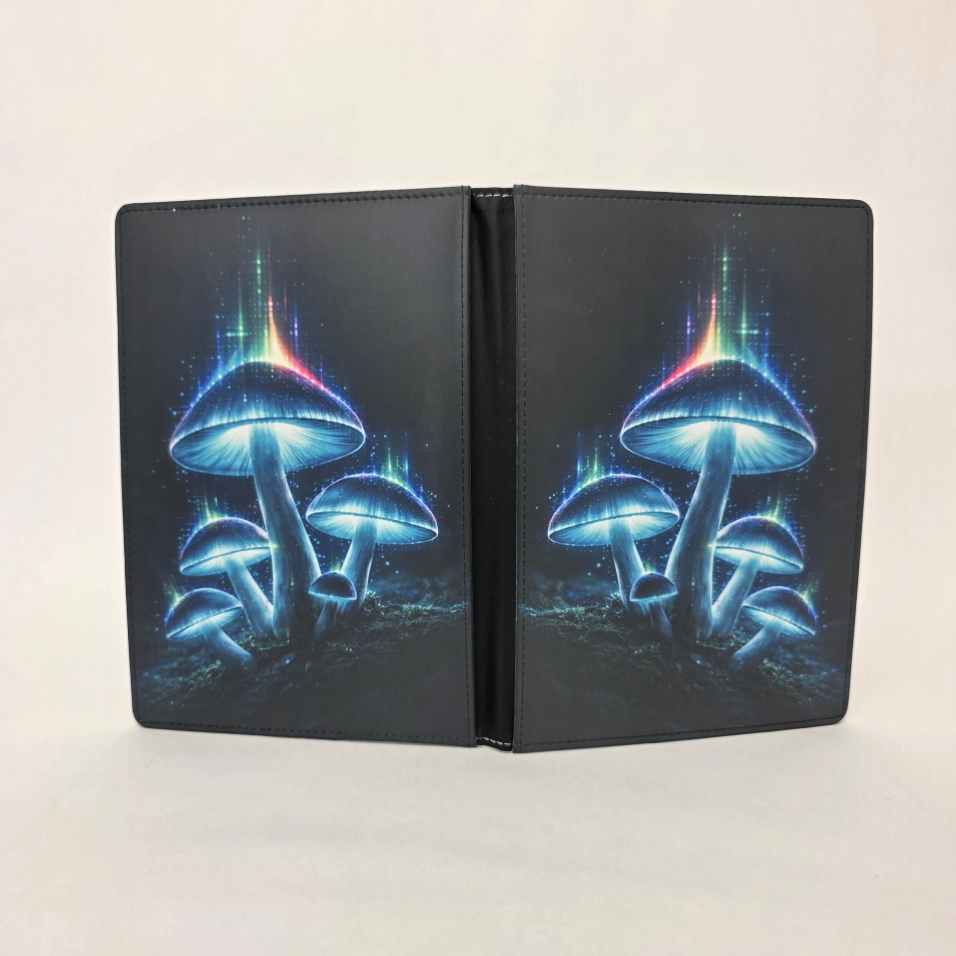 Faux leather journal cover with glowing blue mushrooms design on a white background