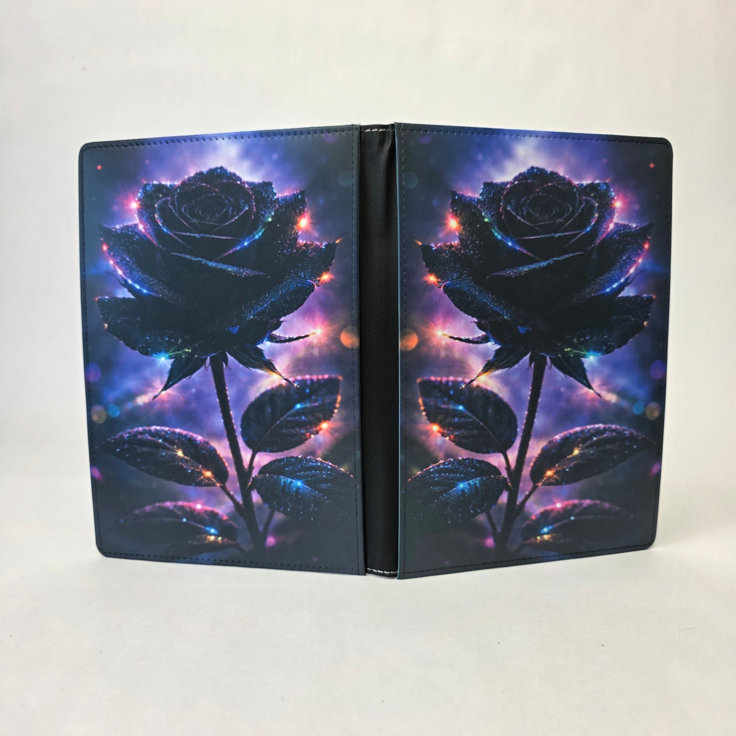 A journal cover with a black rose.