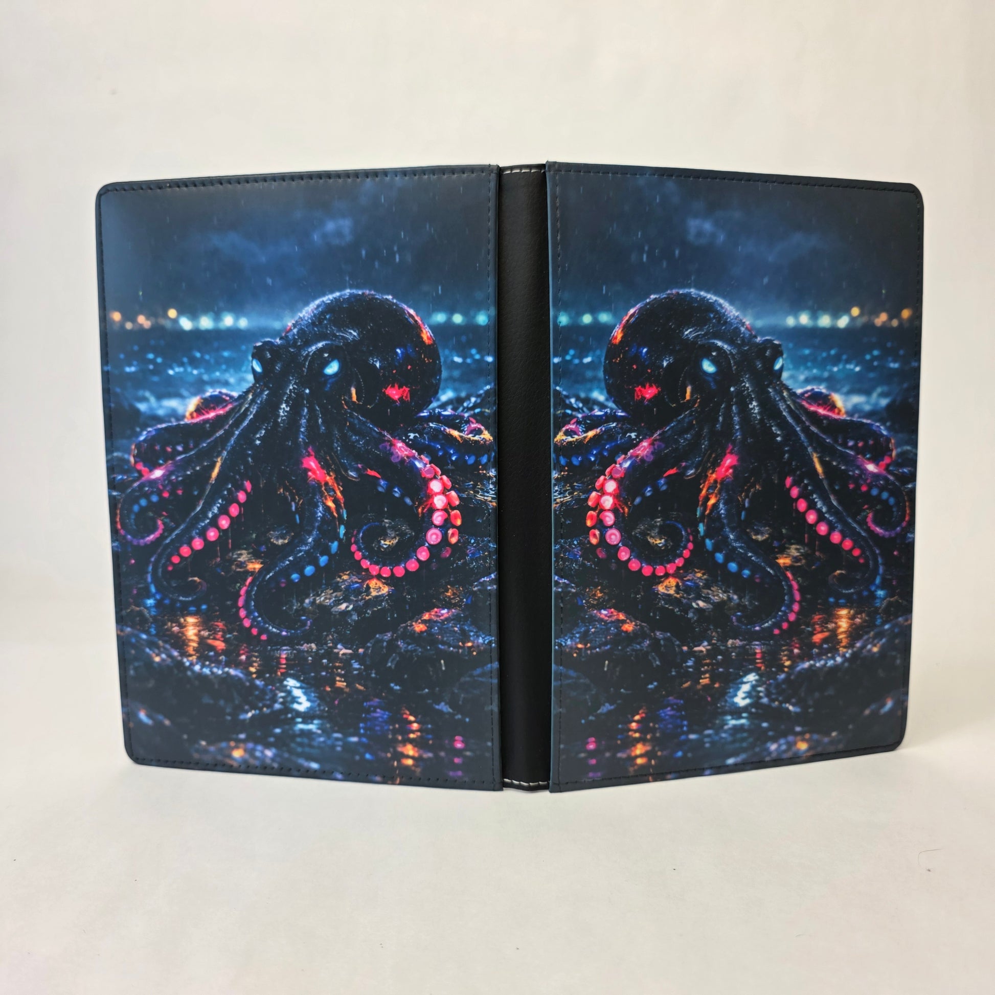 A journal cover with a neon octopus sitting on a rock.