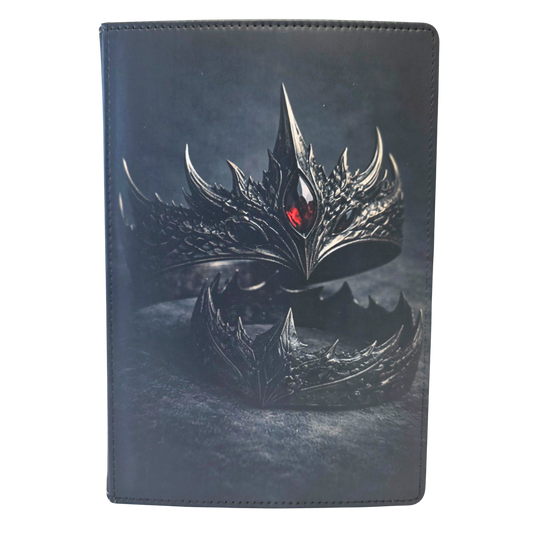 Journal cover featuring iron crowns with dragon scales and a red jewel. Gray background.