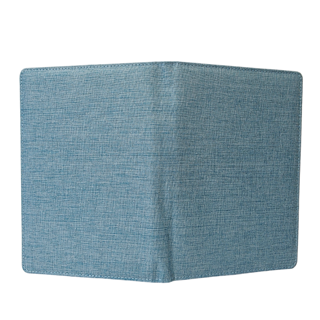 Blue fabric notebook on a white background