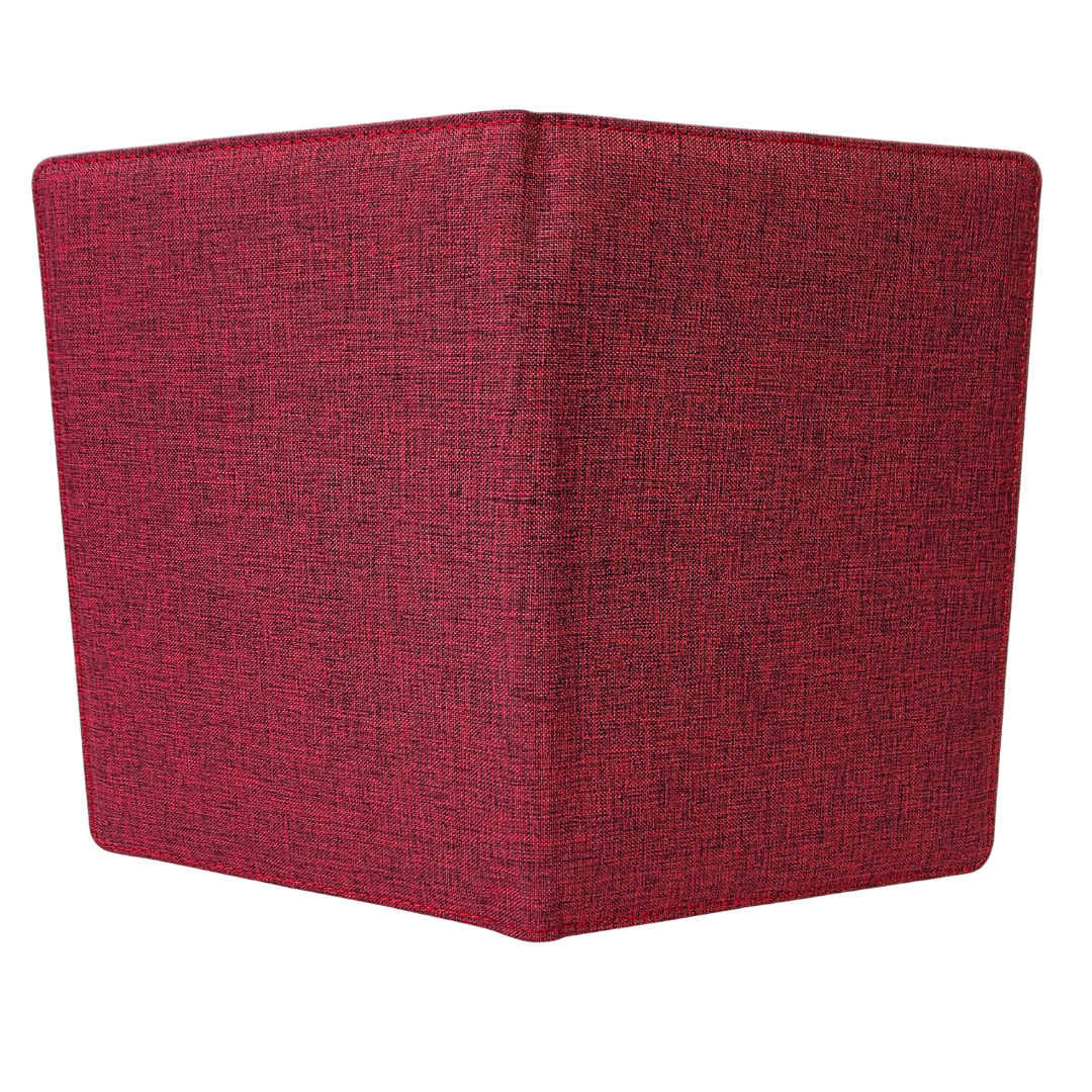 Red fabric notebook on a white background