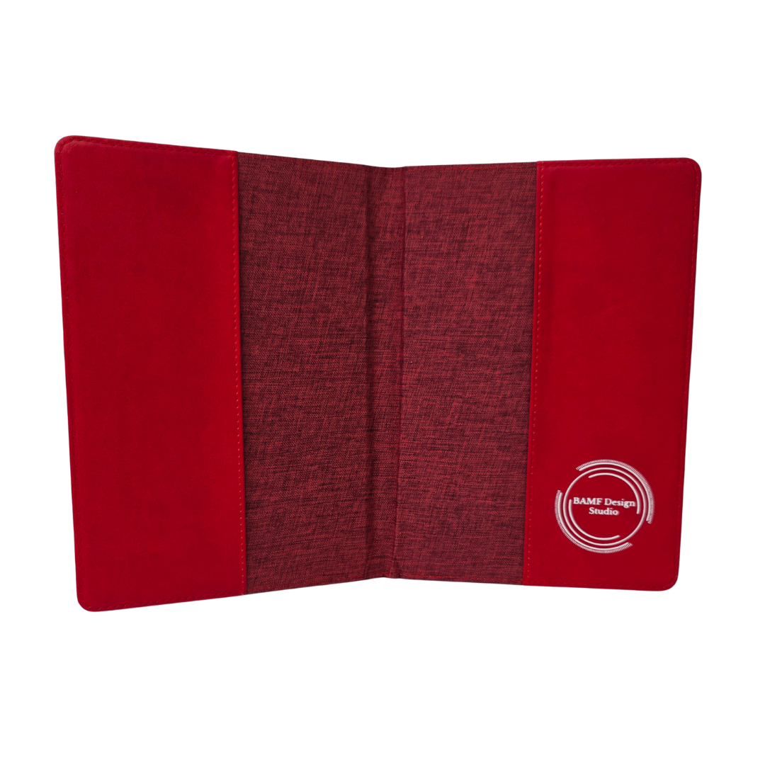 Inside of a Red fabric journal cover with a visible brand logo on a white background